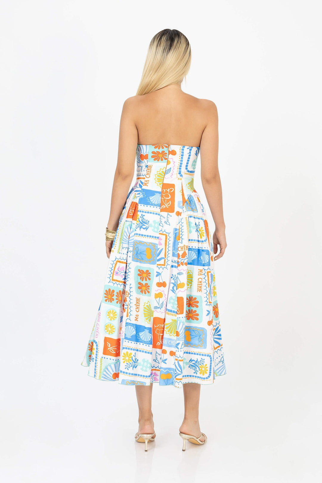 Vestido strapless estampado vibrante