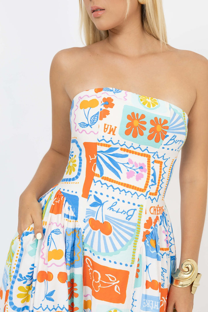 Vestido strapless estampado vibrante