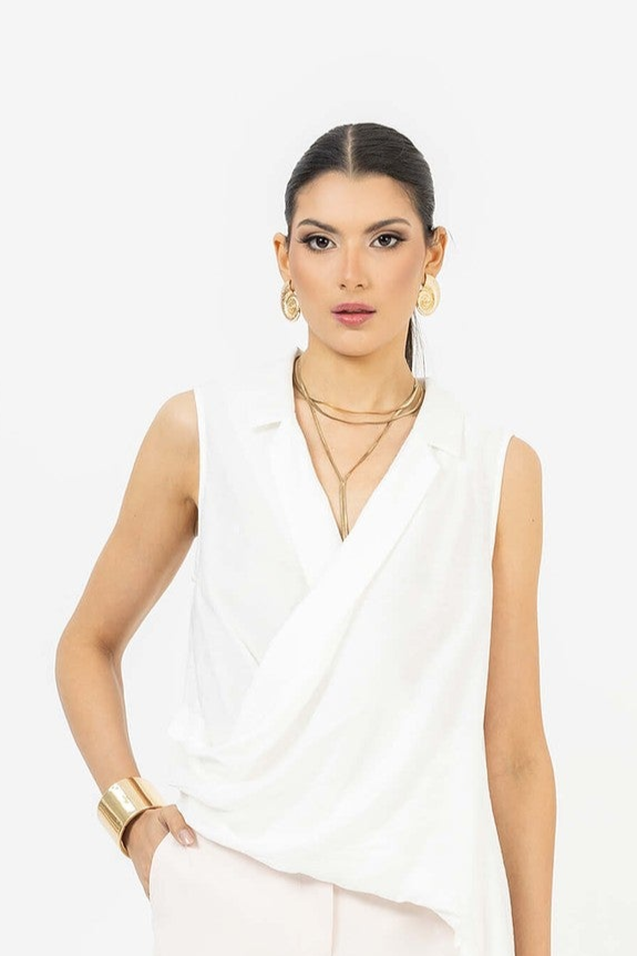 Blusa asimétrica con drapeado