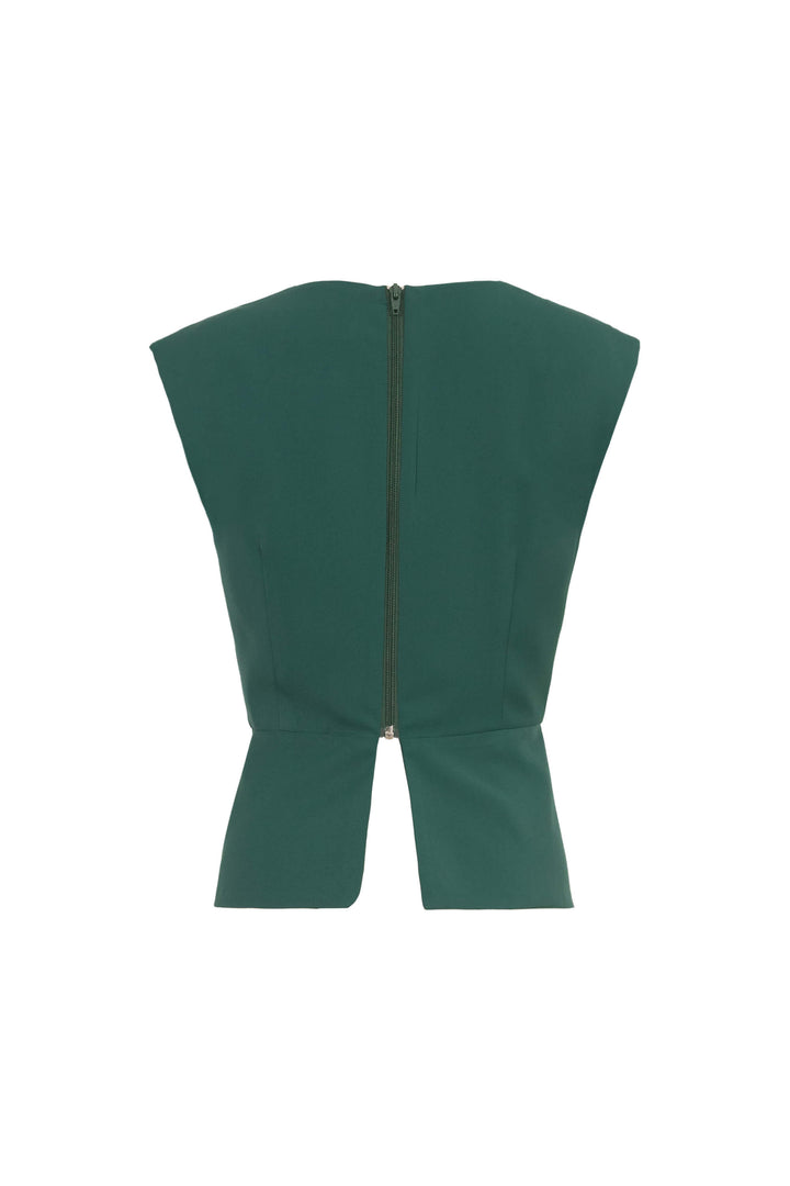 Blusa elegante con flor y moño