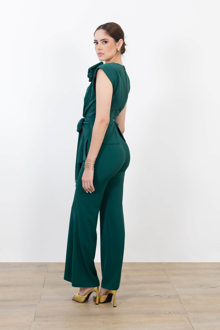 Blusa elegante con flor y moño