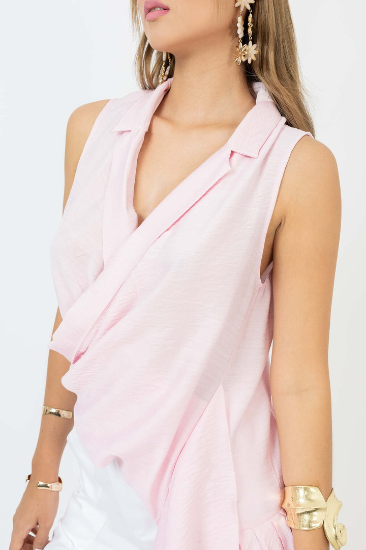 Blusa asimétrica con drapeado