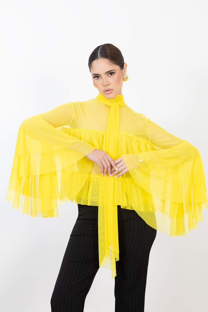 Blusa de tul con volantes
