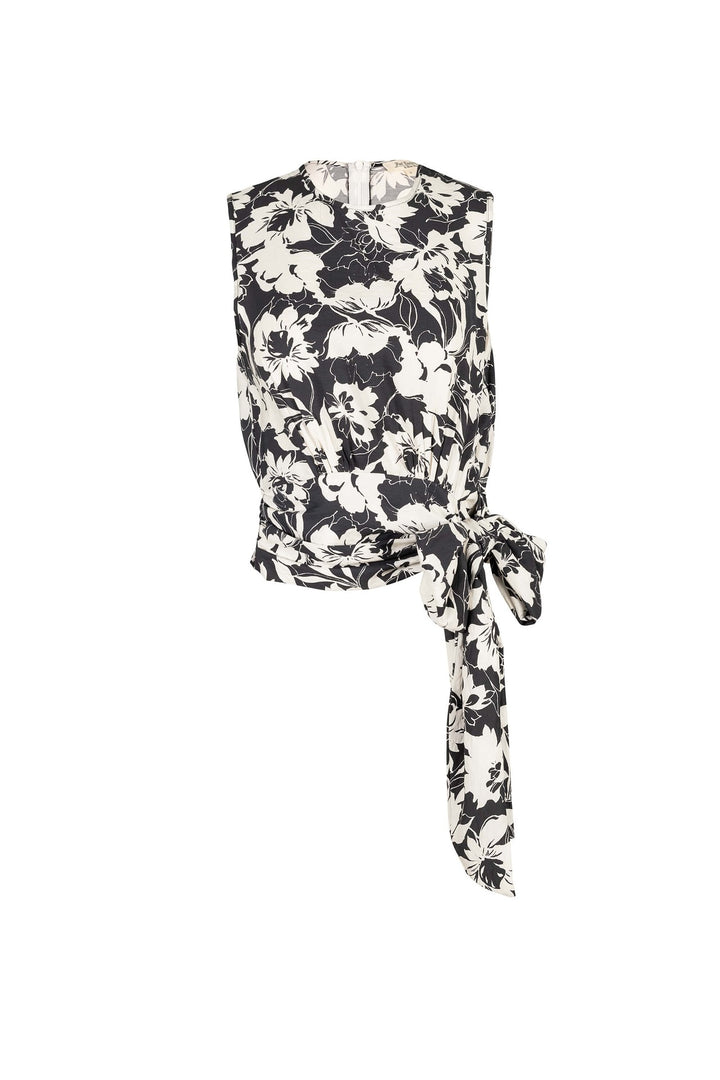 Blusa con moño lateral