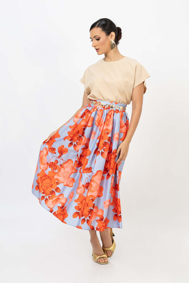 Blusa corta con resorte y manga amplia