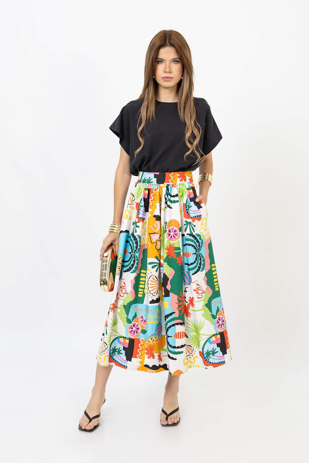 Blusa corta con resorte y manga amplia