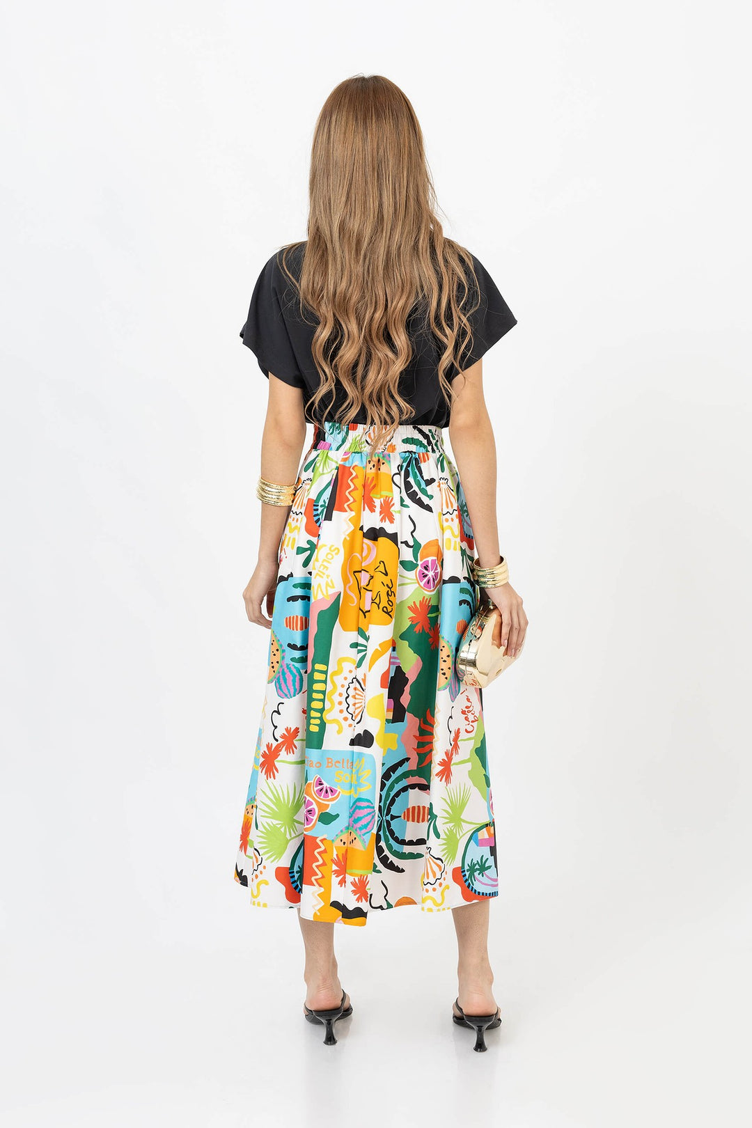 Blusa corta con resorte y manga amplia