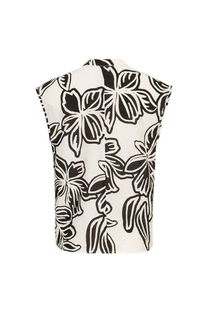 Blusa estampada con lazo elegante