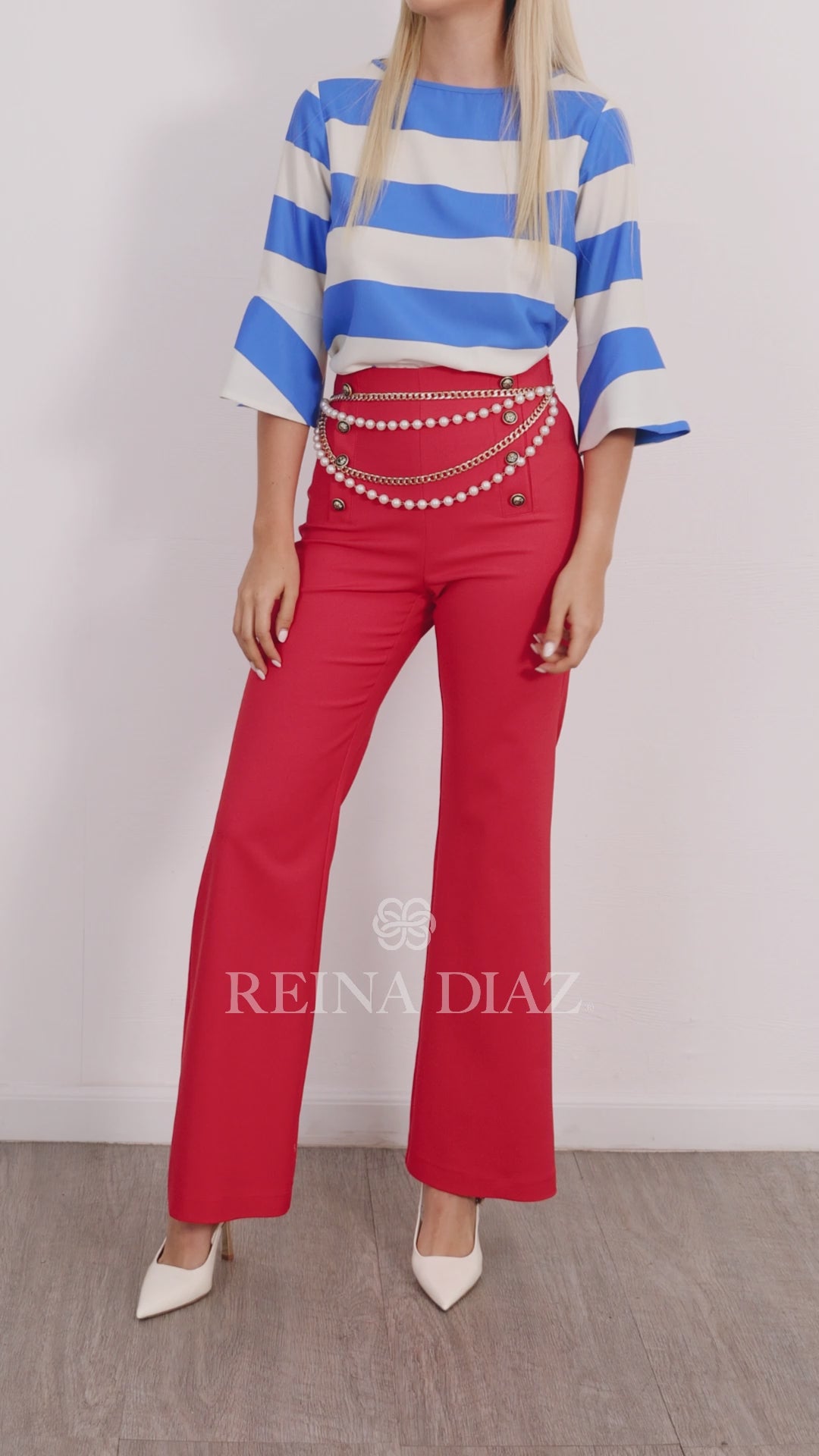 Pantalón palazzo con botones dorados