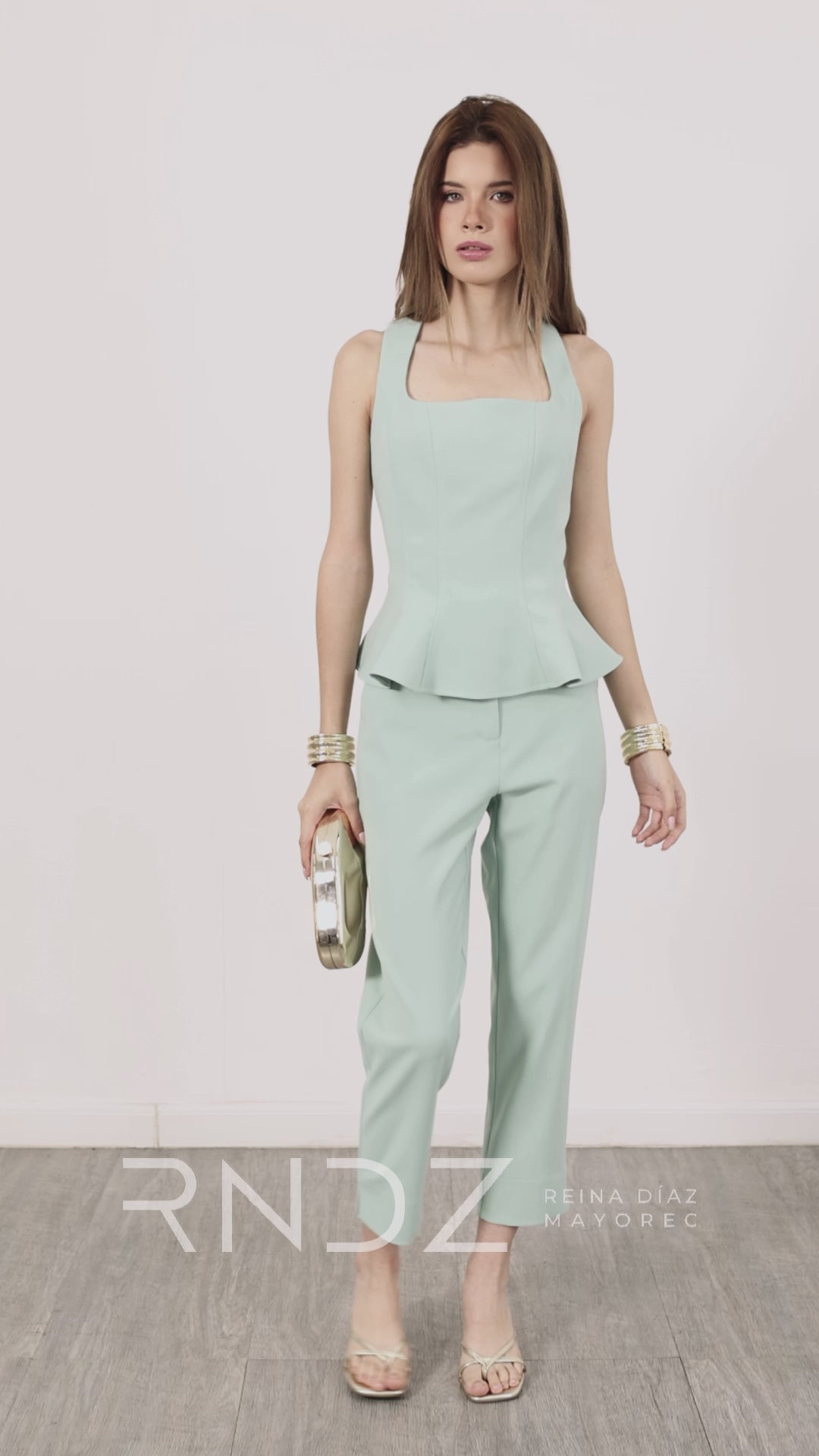 Blusa peplum sin mangas con escote cuadrado