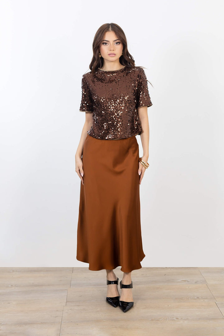 Blusa de lentejuelas con lazos