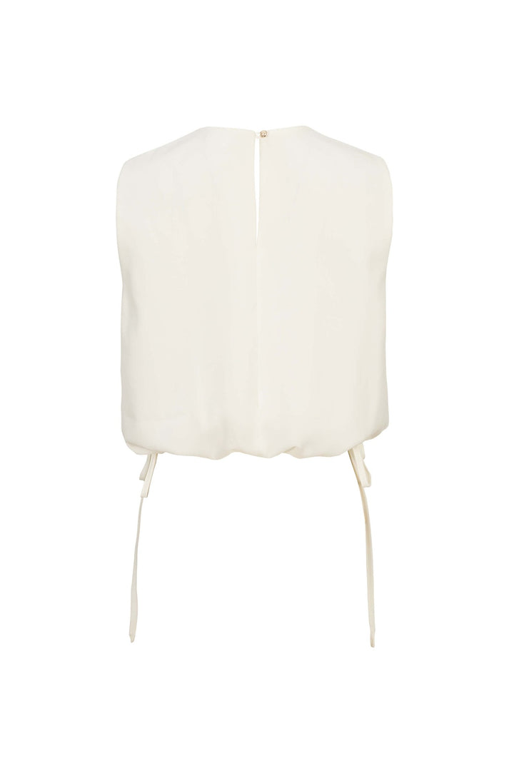 Blusa satinada sin mangas con lazo lateral