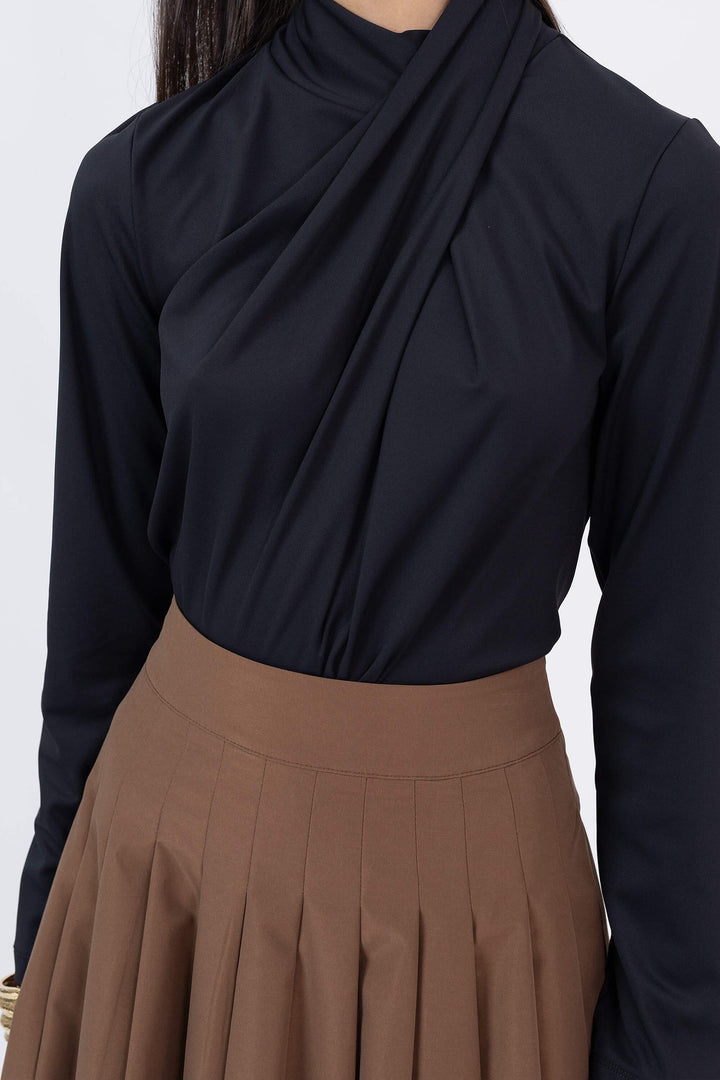 Blusa cruzada de manga larga