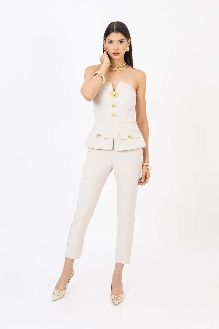 Jumpsuit strapless con botones dorados