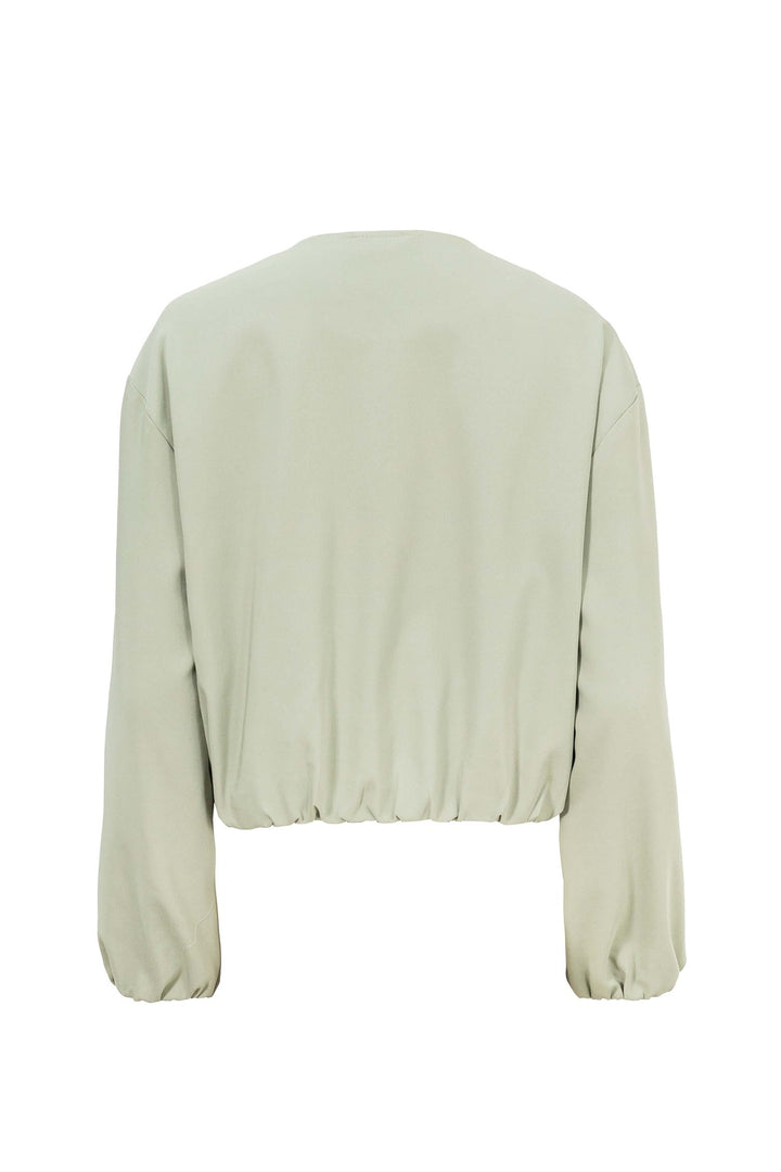 Chamarra tipo rompe vientos