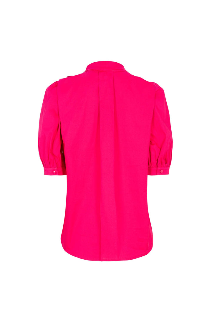 Blusa elegante con moño y manga abullonada