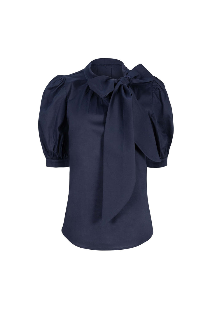 Blusa elegante con moño y manga abullonada